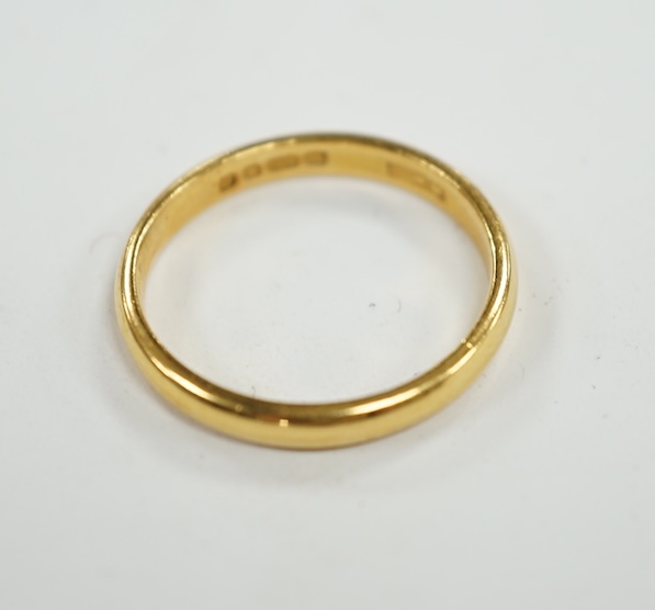 A 22ct gold wedding band, size N, 3.3 grams. Condition - fair to good